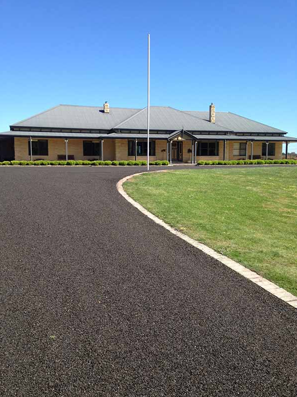 This is a photo of an asphalt driveway which has been installed by Labrador Surfacing Solutions 